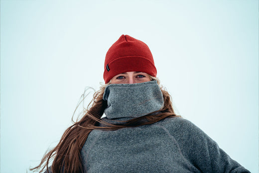A woman bundled up in Merino wool gear.