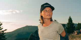 Woman hiking in Montana wearing merino wool.