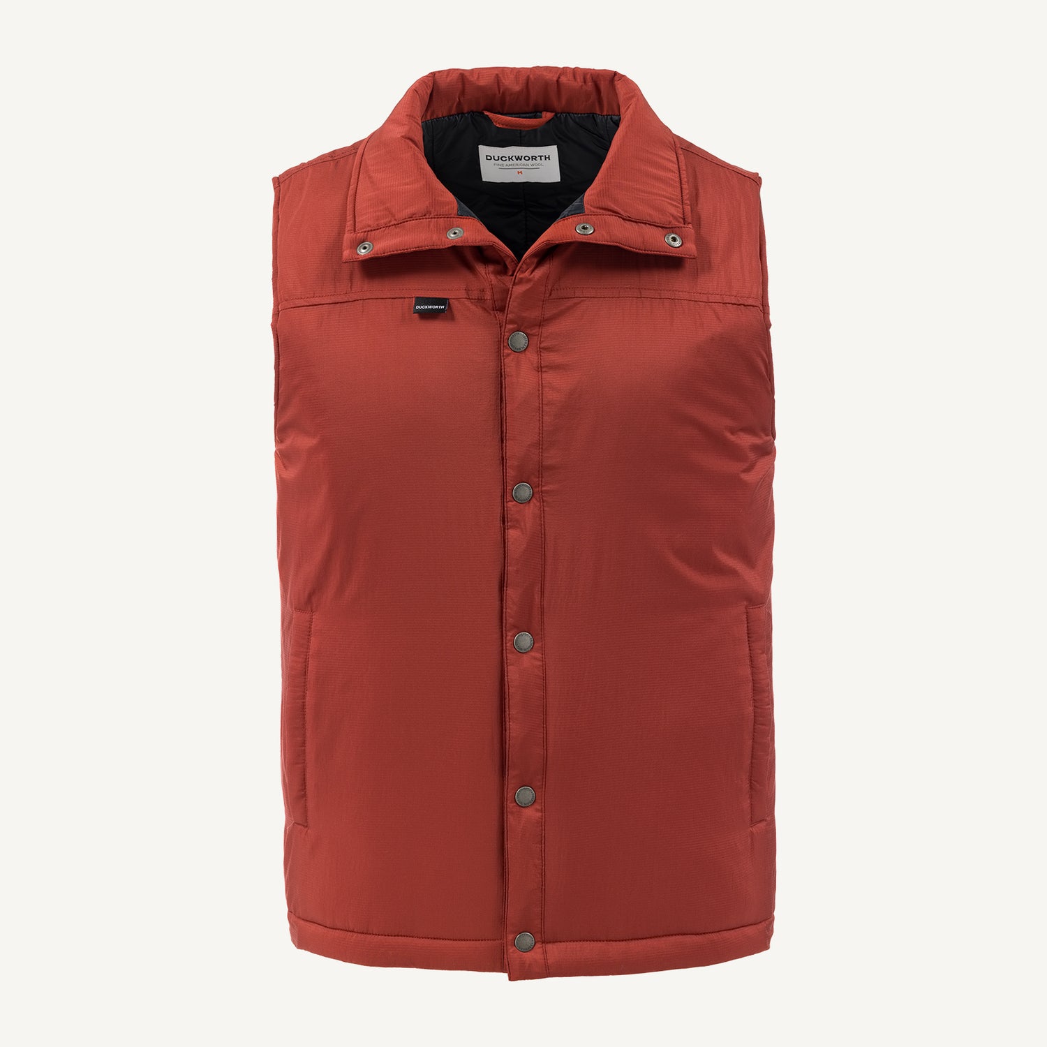 A red American made Duckworth soft shell wool insulated vest.