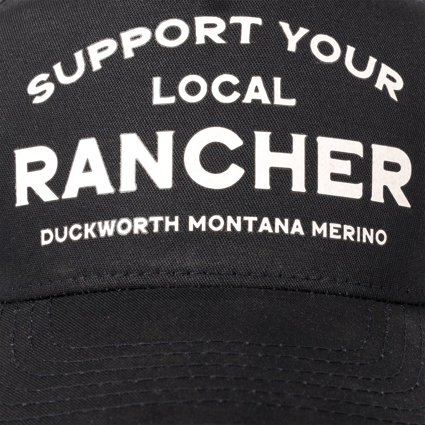 A black American made trucker hat that supports Montana and ranching. 