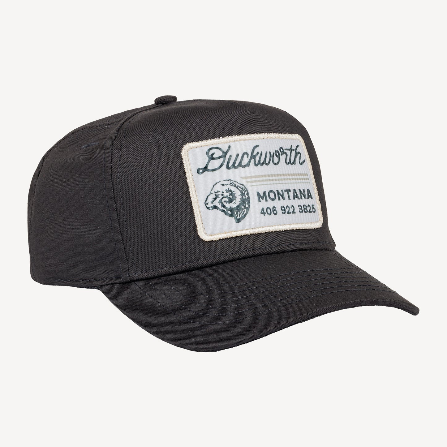 A black 5 panel hat with a retro style Montana patch on it.